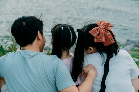 family at water